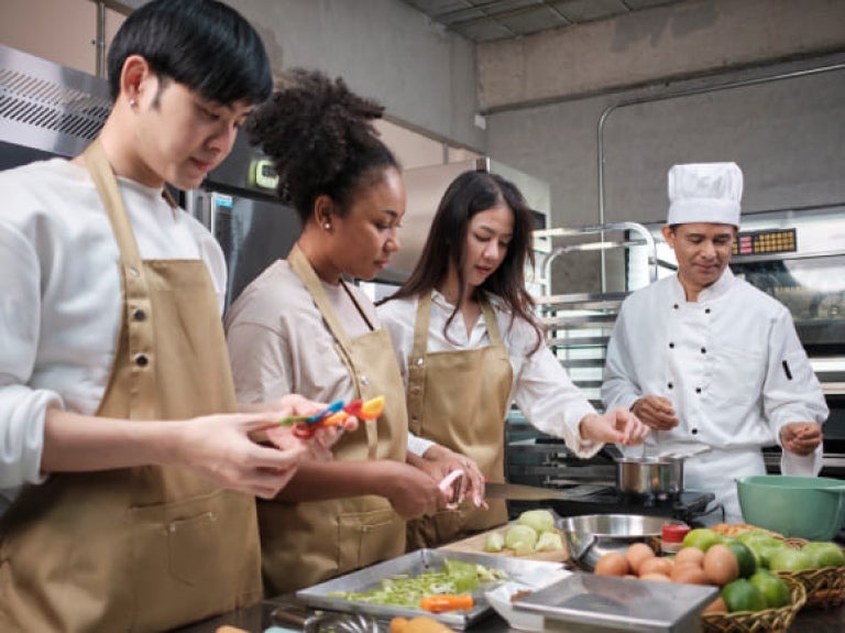 Equipe de chefs gastronômicos