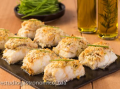 Bacalhau em crosta de amendoas e ervas